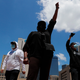 Protesters gather in front of Dallas City Hall in downtown Dallas, Saturday, May 30, 2020